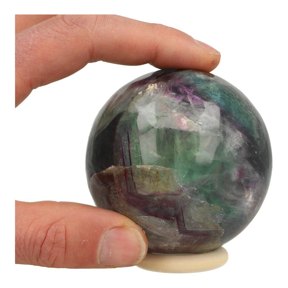 A-kwaliteit regenboog fluoriet bol met diameter van 74mm - in hand