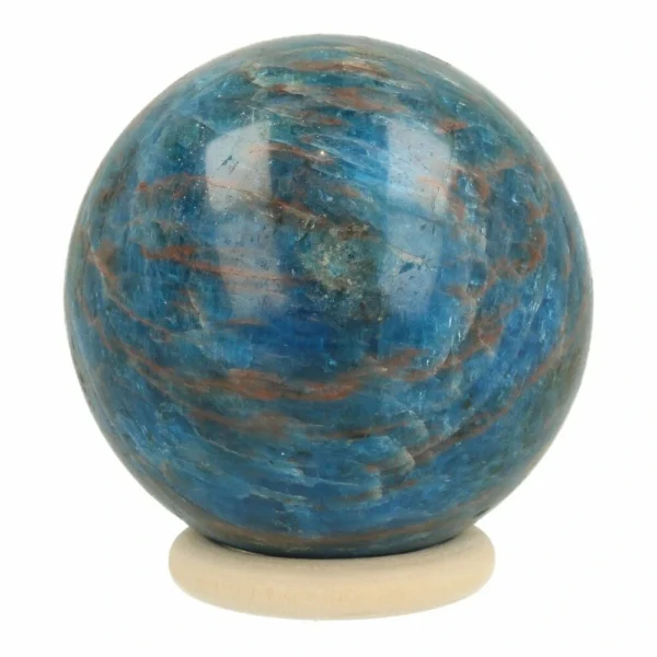 Prachtige blauwe apatiet bol met een diameter van 7cm op houten ring