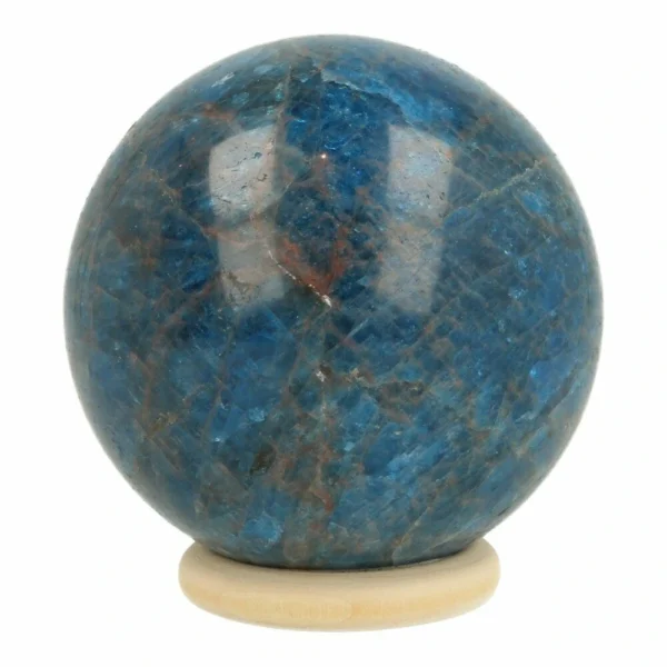 Mooie heldere blauwe apatiet bol van 66mm diameter op houten ring
