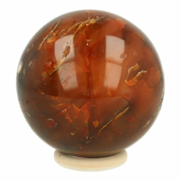 Fijne carneool bol van 8cm diameter op houten ring