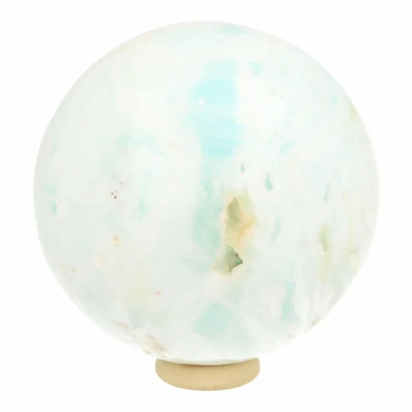 Mooie heldere carribean blue calciet bol van 64mm op houten ring